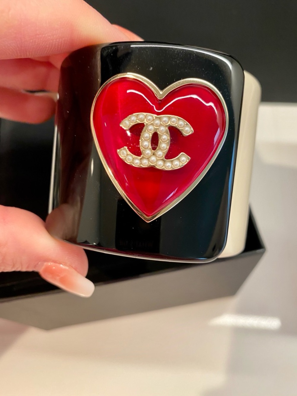 CHANEL Black and White Resin Cuff with Red Heart CC Accent - Picture 2 of 11